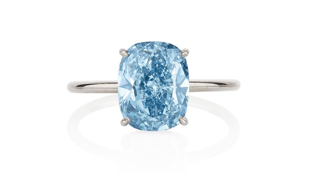 This ring featuring a Type IIb fancy vivid blue diamond weighing 3.24 carats was withdrawn from Phillips’ Geneva jewelry auction. (Photo courtesy of Phillips) 3.24-carat fancy vivid blue diamond ring